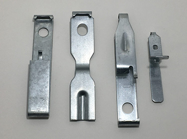 Formed metal components used to illustrate process-comparison guidance